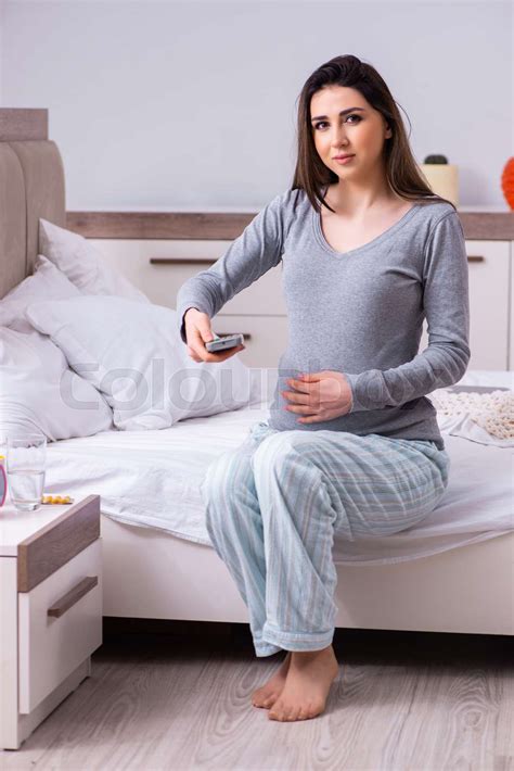 Young Pregnant Woman In The Bedroom Stock Image Colourbox