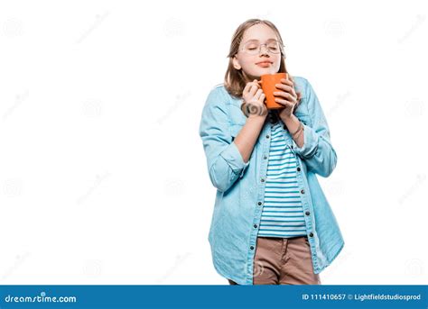 Teenage Girl In Eyeglasses Holding Cup Of Tea Isolated On White Stock