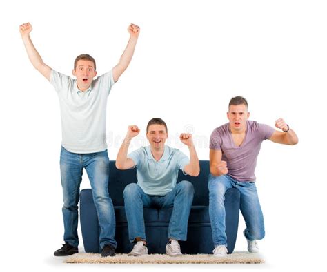 Young Men Sitting On A Sofa Cheering Stock Photo Image 28363250