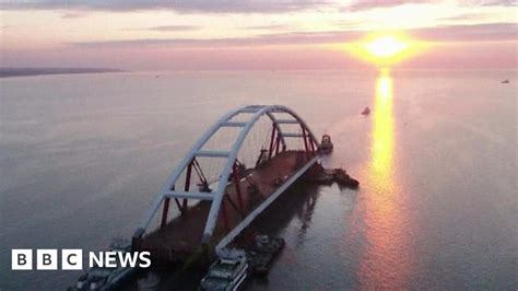 russia ukraine motorway arch towed out for crimea bridge bbc news
