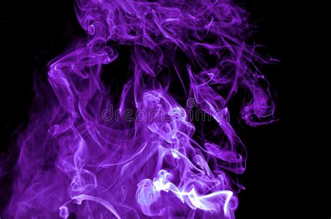 Abstract Purple Smoke On Black Background Stock Image
