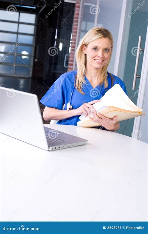 Female Nurse At A Desk Working Stock Photo Image Of Chart Isolated