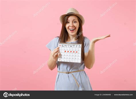 Portrait Young Woman Blue Dress Hat Holding Periods Calendar Checking
