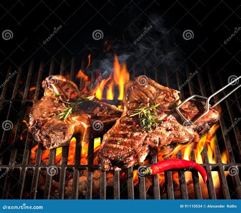 Beef T Bone Steaks On The Grill Stock Photo Image Of Glowing