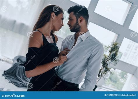 Young And Playful Couple Stock Image Image Of Glamour 150232825
