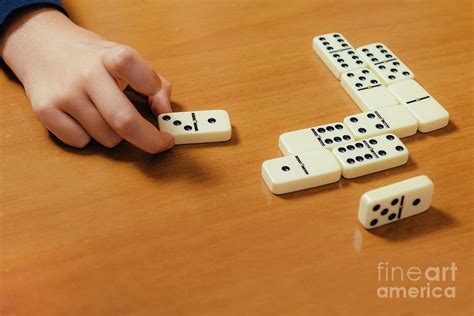 Boy Playing Dominoes Photograph By Microgen Imagesscience Photo