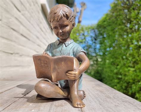 Bronze Sculpture Of A Boy Reading A Book Bronze Garden Ornaments