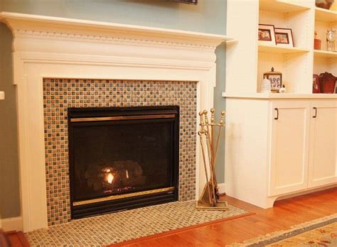 It gives the entire wall a cohesive look, and a lot of function at the same time. Fireplace : Contemporary Mosaic Glass Tile Fireplace ...