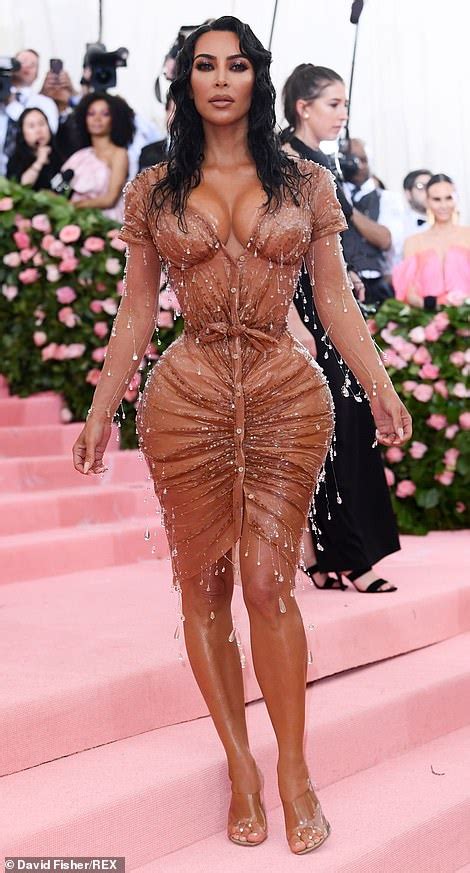 kim kardashian accentuates her hourglass curves in skintight caramel thierry mugler corset dress