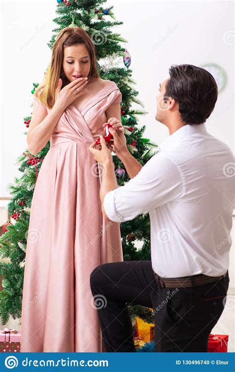 The Man Making Marriage Proposal At Christmas Day Stock Photo Image