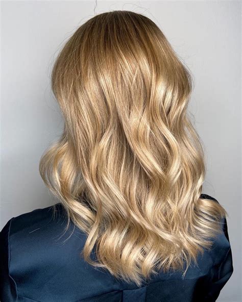 Bright And Breezy Wavy Sunlight Blonde Hair Colored By Salonki Ash Blonde Balayage Bronde