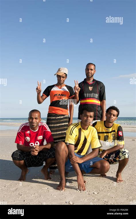 Five People On Maghsil Bay Beach In Salalah Dhofar Oman Stock Photo