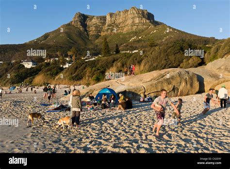 People On The Beach Of Llandudno Western Cape South Africa Stock