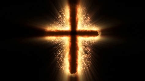 Religious cross on fire and sparkles Motion Background - Storyblocks