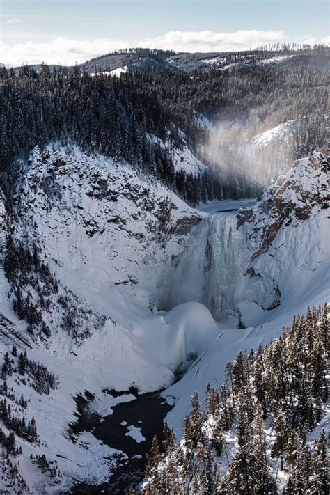 Frozen Yellowstone Canyon Waterfall Frozen In Winter Stock Photo