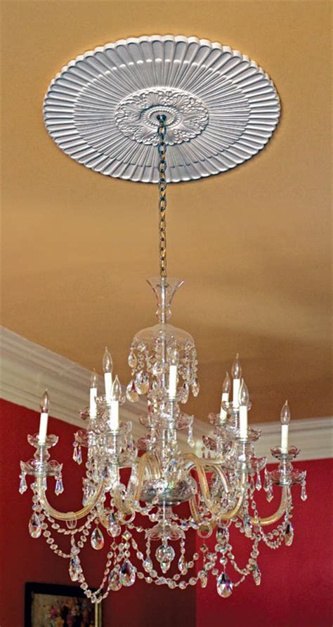 Smooth white finish ceiling medallion offers a versatile, easily installed backdrop for any ceiling fan or lighting fixture. How To Decorate with Ceiling Medallions - Old-House Online ...