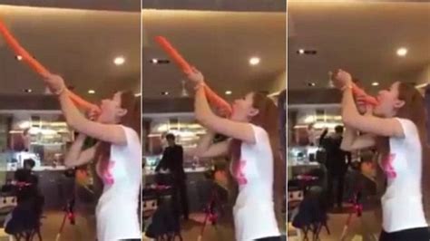 Woman Puts 4ft Long Balloon In Her Mouth And Swallows It Whole Daily