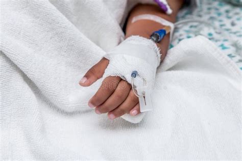 Child S Patient Hand With Saline Intravenous Iv Drip Stock Image