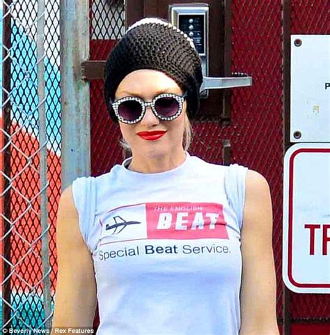 Gwen Stefani Dons A Massive Knit Beanie As She Emerges On A Hot