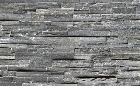 Stone Wall Cladding Made Of Horizontal Gray Brown And