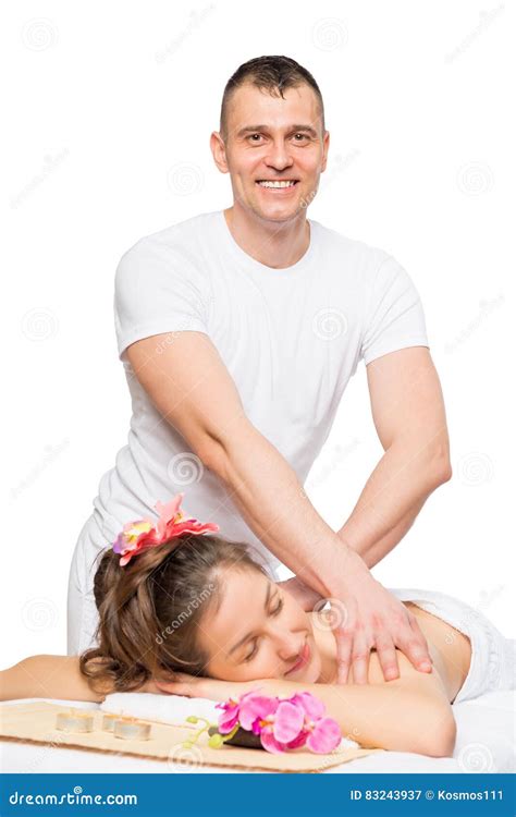 A Male Massage Therapist Doing An Elbow Massage To A Young Girl Stock Image