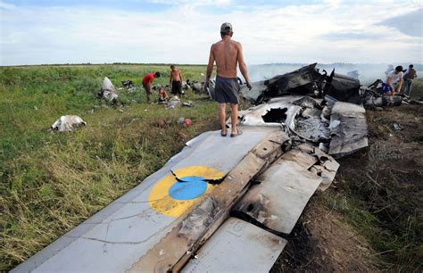 Ukrainian Military Plane Is Shot Down as Russia Adds to Presence at