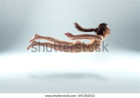 Beautiful Naked Woman Levitating Isolated On Stock Photo Shutterstock