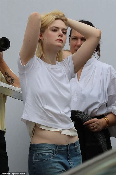 Elle Fanning Flashes Her Midriff While Posing Up A Storm On Streets Of Manhattan Daily Mail Online