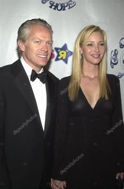 Kudrow with husband and son, source: Lisa Kudrow and husband Michel Stern - Stock Editorial Photo © s_bukley #17796691