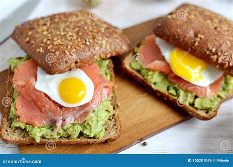 Smoked Salmon Sandwich With Avocado And Quail Egg Stock Photo Image
