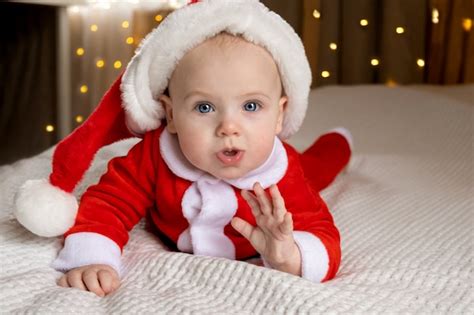 Premium Photo Beautiful Little Child Is Celebrating Christmas A Child