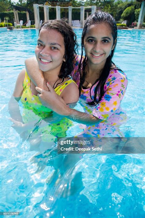 Portrait Of A Cute Young Girls In Swimming Pool Stock Images High Res