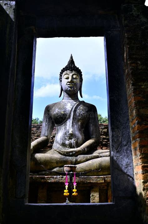 View Through The Frame On Seated Buddha Statue In Famous Sukhothai