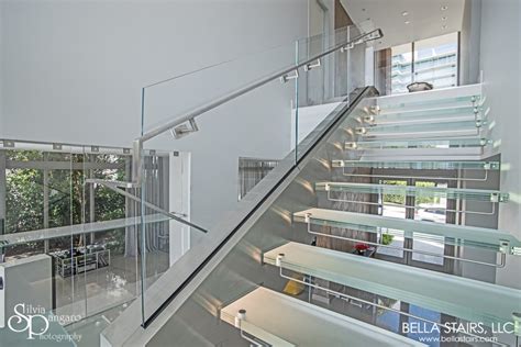Etching describes the process of altering the glass surface. Floating Glass Staircase with LED Lighting | Bella Stairs
