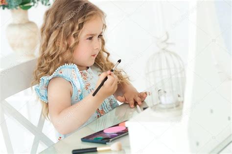 Cute Little Girl Applying Make Up Looking Into Mirror Little Fa
