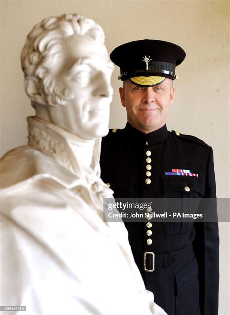 Garrison Sergeant Major William Mott Of The Welsh Guards Stands Next