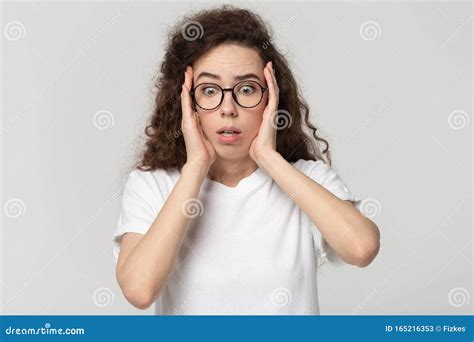 Frustrated Millennial Girl In Glasses Feel Terrified Or Scared Stock