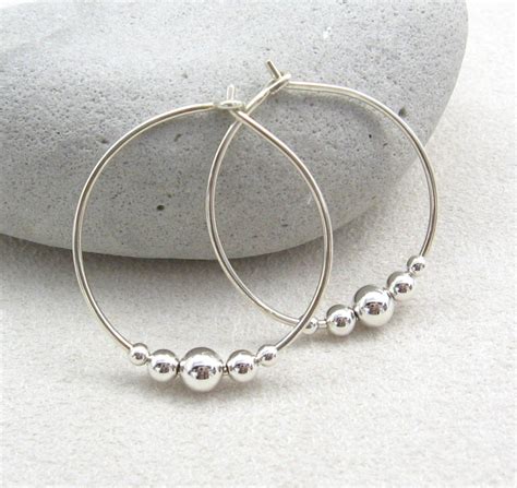 Sterling Silver Hoop Earrings With Silver Beads