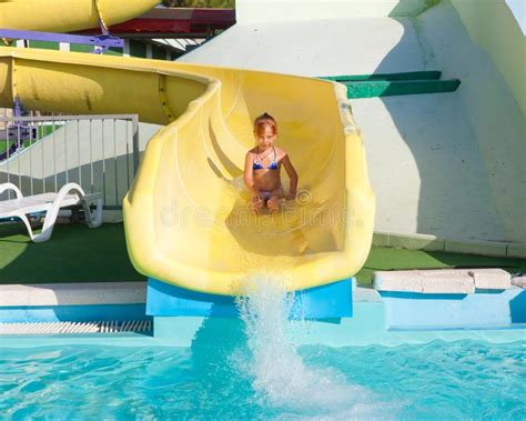 Child On A Slide In The Water Park Stock Image Image Of Leisure