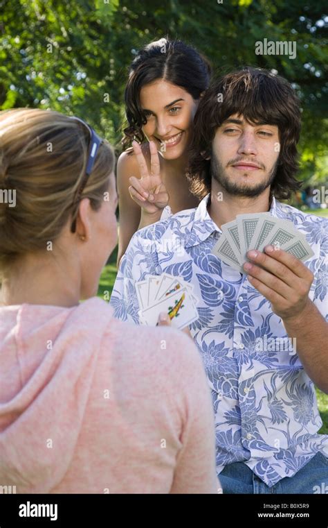 Friends Playing Cards Stock Photo Alamy