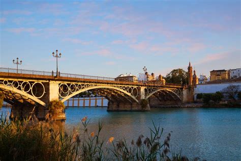 Puente Isabel Ii Bridge Sunset In Triana Seville Stock Photo Image Of