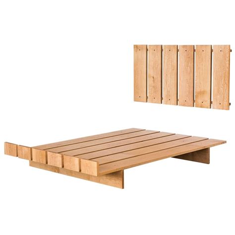 For a more modern look, try a queen platform bed frame with storage instead. Lane King-Size Platform Bed with Floating Nightstands at ...