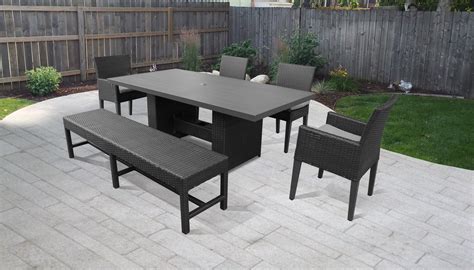 If you want to add extra seating to a dining table, pick a mix of dining chairs and a bench to accommodate a few more guests. Belle Rectangular Outdoor Patio Dining Table With 4 Chairs ...