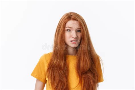 Happy Cheerful Young Woman Wearing Her Red Hair Looking At Camera