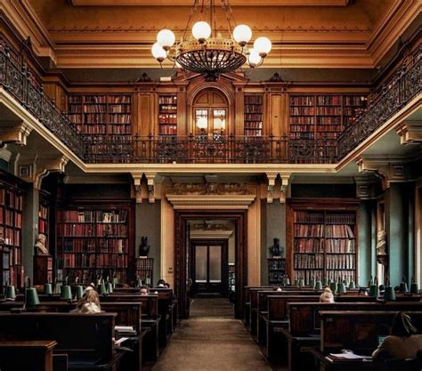 An Old Library Filled With Lots Of Books