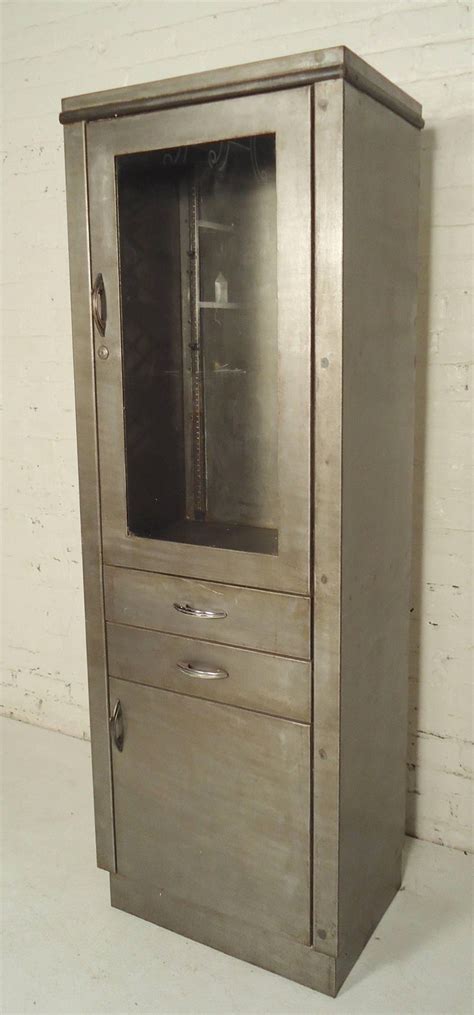 Standard shelves and baskets often create more work and inconvenience. Industrial Hospital Cabinet Restored For Sale at 1stdibs