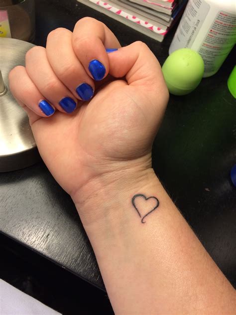 Pin By Tristan Stringer On Tattoo Ideas Heart Tattoo Wrist Wrist