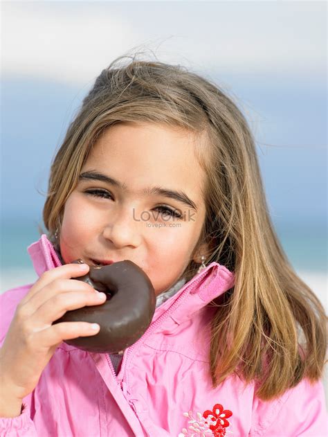 Girl Eating Chocolate Donut Picture And Hd Photos Free Download On Lovepik