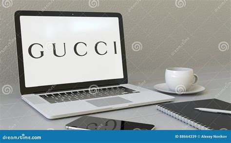 Laptop With Gucci Logo On The Screen Modern Workplace Conceptual
