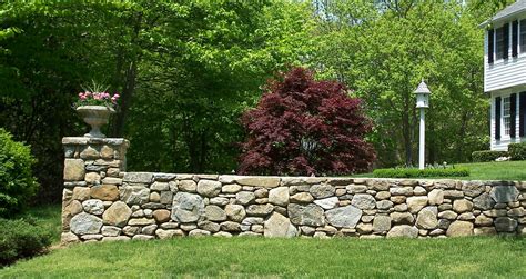 One Of Our Winning Fieldstone Wall Designs Stone Wall Front Entrances Fieldstone